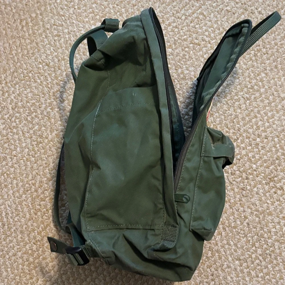 Fjallraven Kanken Olive Green Backpack with Round Logo
